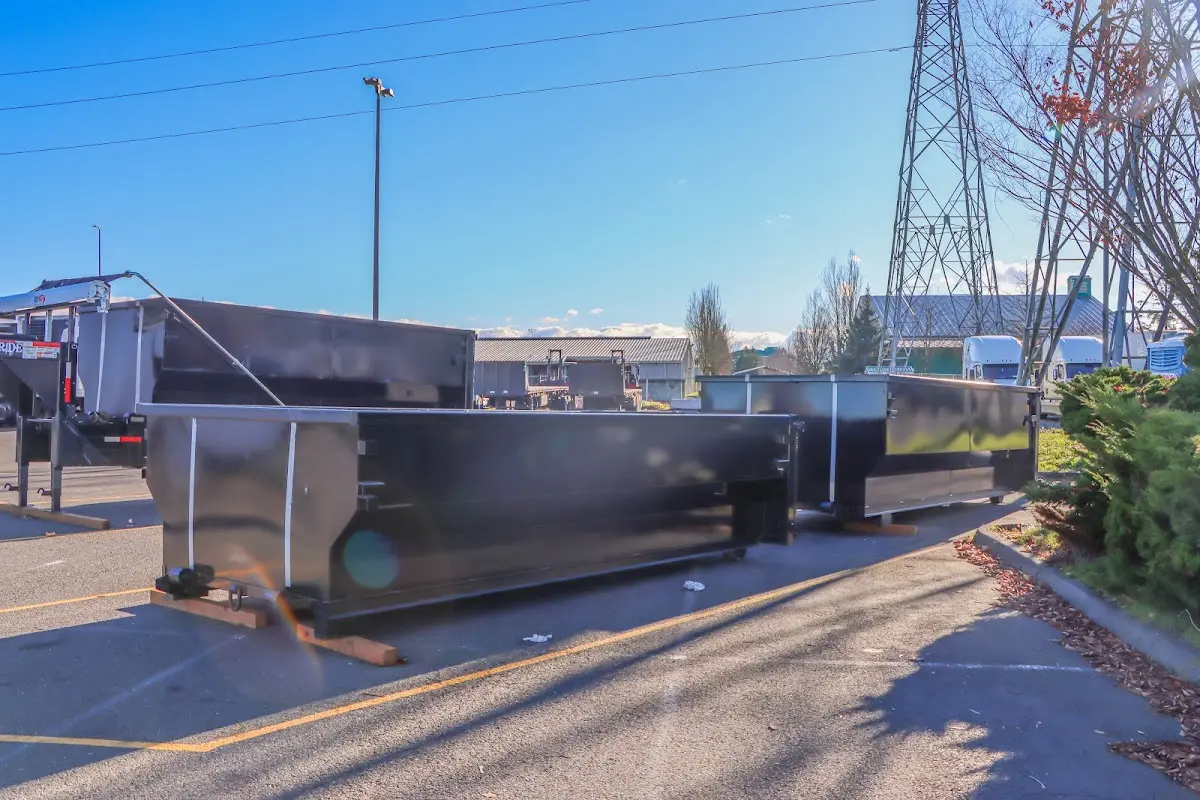 Roll-off dumpster ready for waste disposal at job site for 2 Yard Dumpster Rental in North Highlands